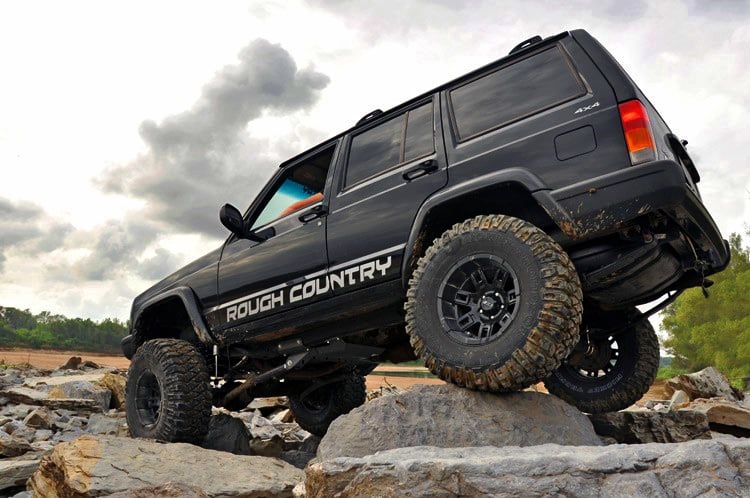 Black Jeep Cherokee with a lift kit